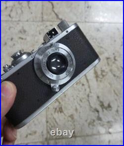 Leica E standard w elmar 5cm and clip on HFOOK rangefinder w foot