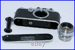 Leica IIIa 35mm rangefinder camera. Summar 5cm f2 standard lens. Case and Instr