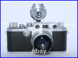 Leica IIIc 35mm rangefinder camera. Summitar 5cm f2 lens. Case, finder, filters